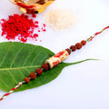 Designer Floral Ceramic Rudraksh Rakhi with Roli Chawal