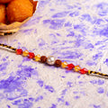 Handmade Designer Multicolor Crystal Rakhi with Roli Chawal