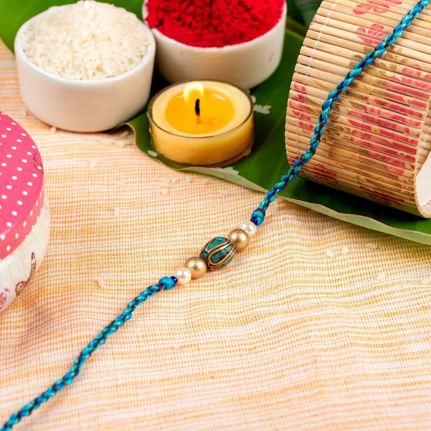 Turquoise Tibetan Golden Bead Designer Rakhi with Roli Chawal