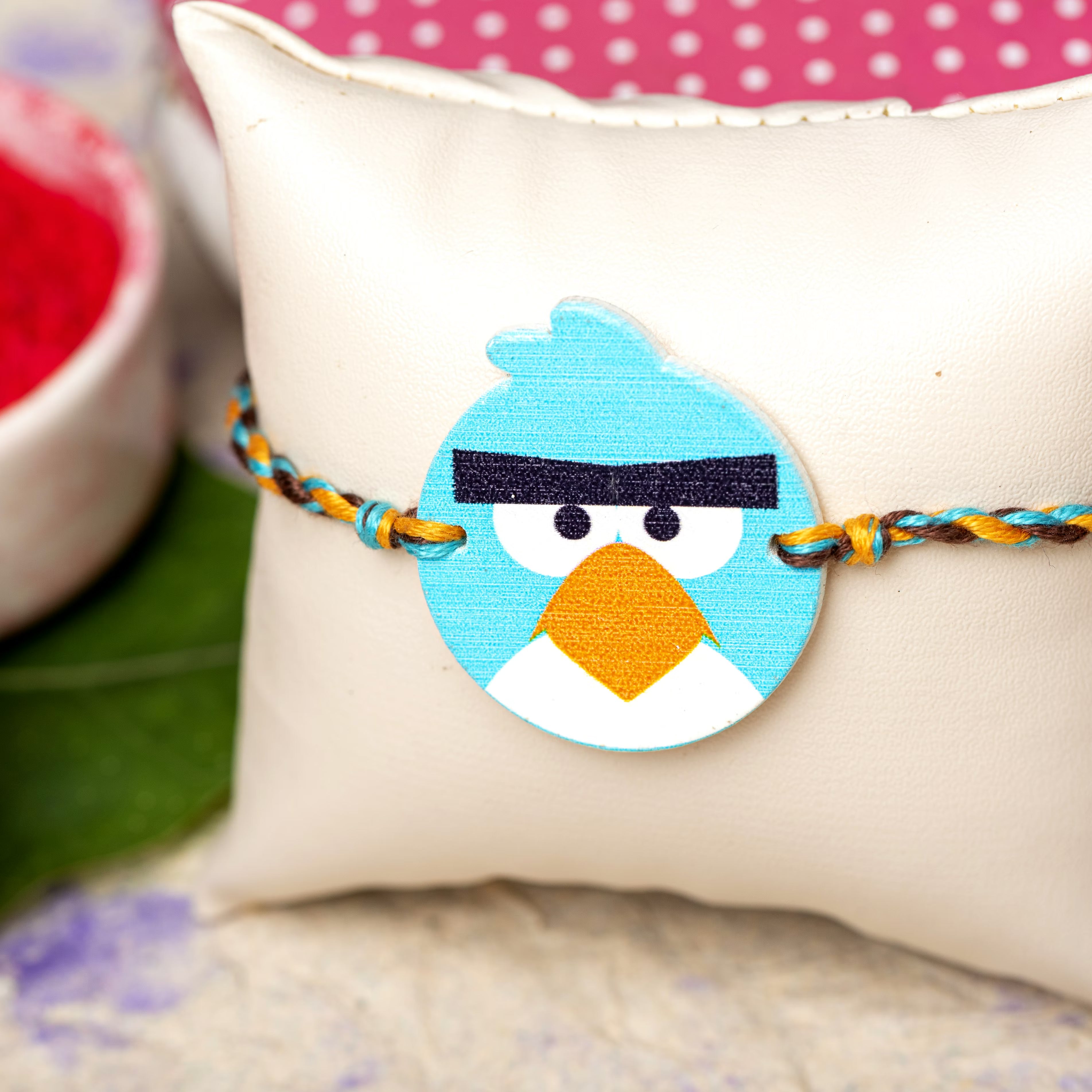 Wooden Turquoise Blue Angry Bird Rakhi for Kids with Roli Chawal - Lookandadorn.com