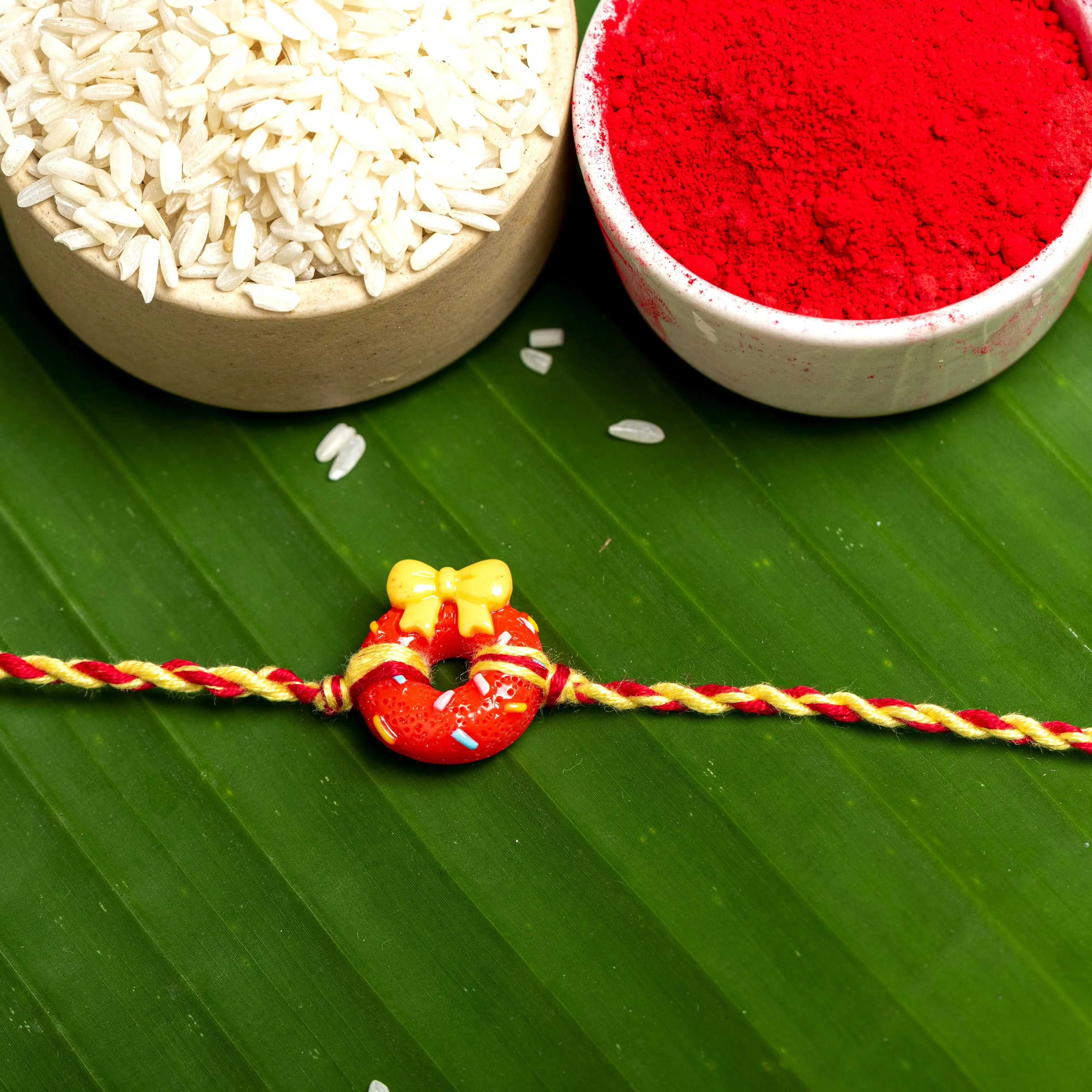 Acrylic Red Doughnut Rakhi Yellow Red Dori Roli Chawal for Boys & Kids - Lookandadorn.com