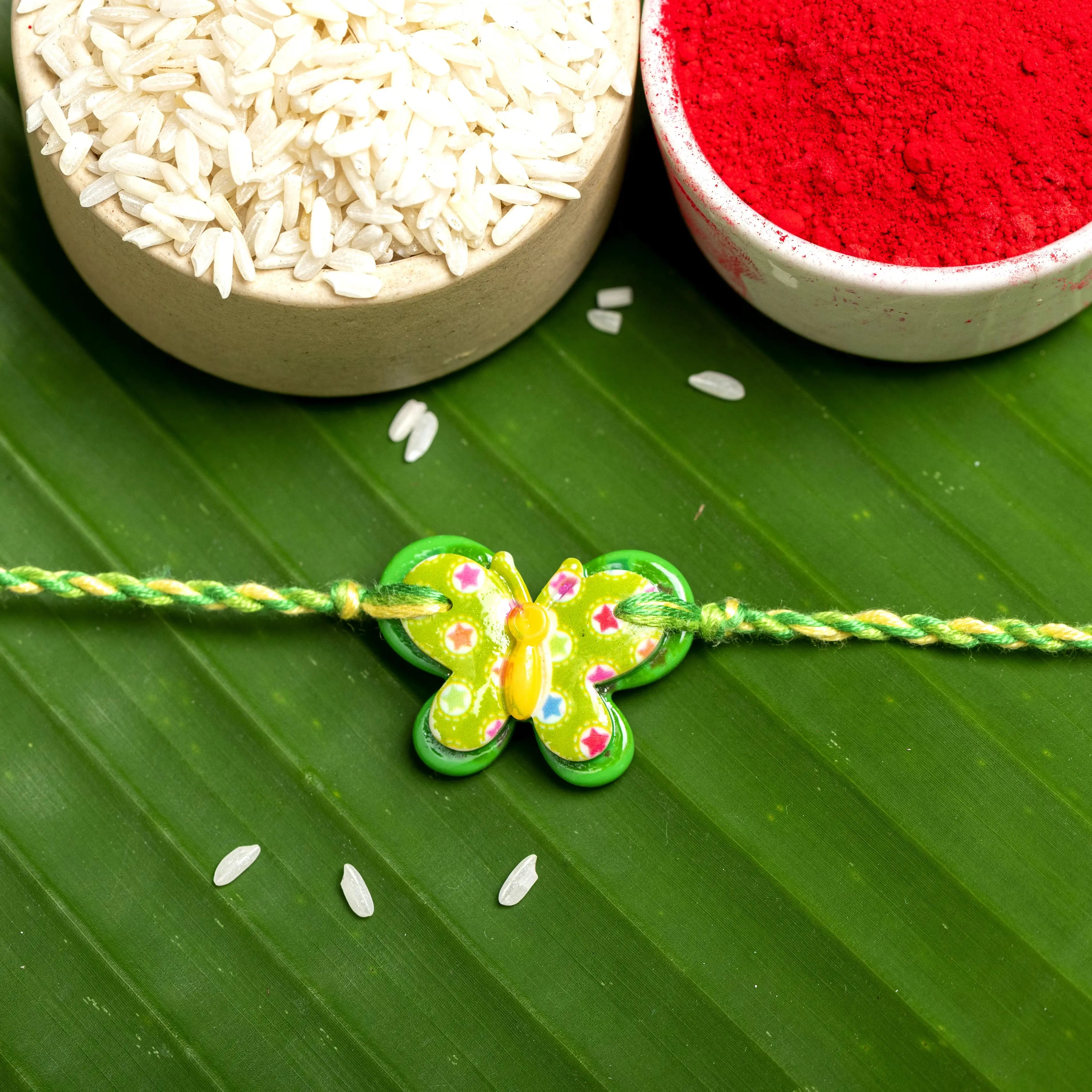Acrylic Green Butterfly Rakhi with Yellow Green Dori Roli Chawal for Boys & Kids - Lookandadorn.com