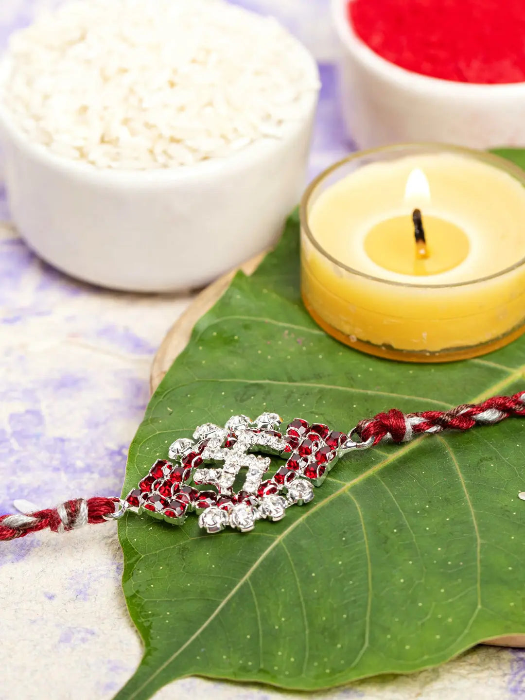 Exclusive American Diamond Maroon Swastik Rakhi Bracelet with Grey Maroon Dori Roli Chawal for Boys & Men - Lookandadorn.com