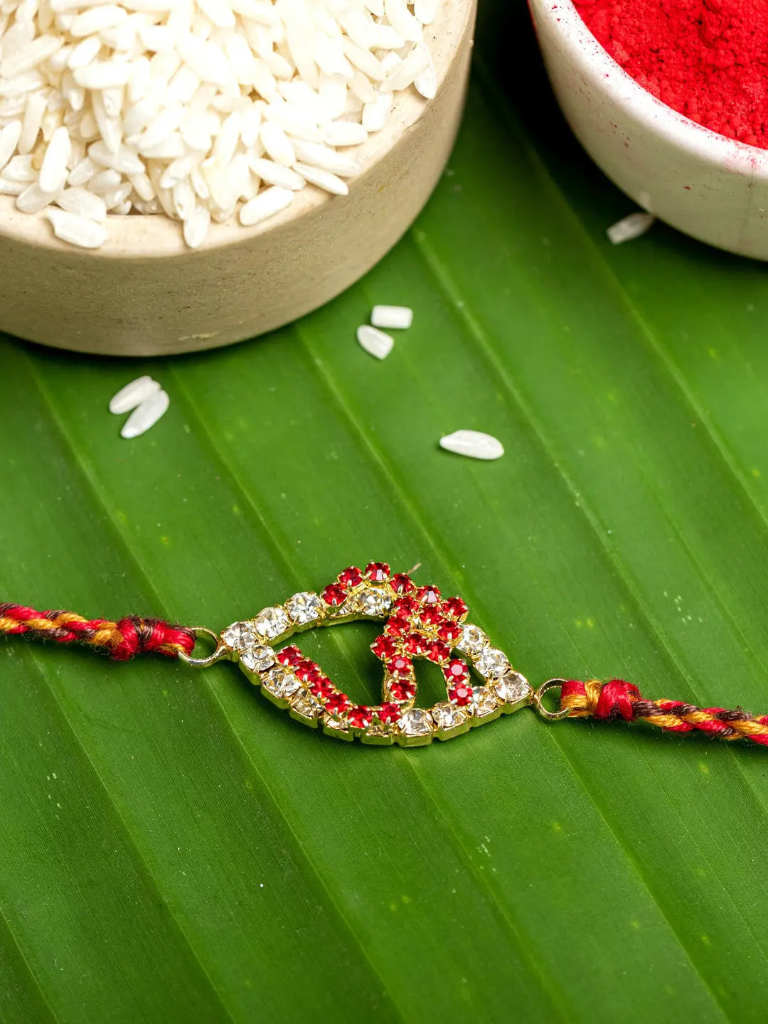 Exclusive American Diamond OM Rakhi Bracelet with Red Golden Dori Roli Chawal for Boys & Men - Lookandadorn.com