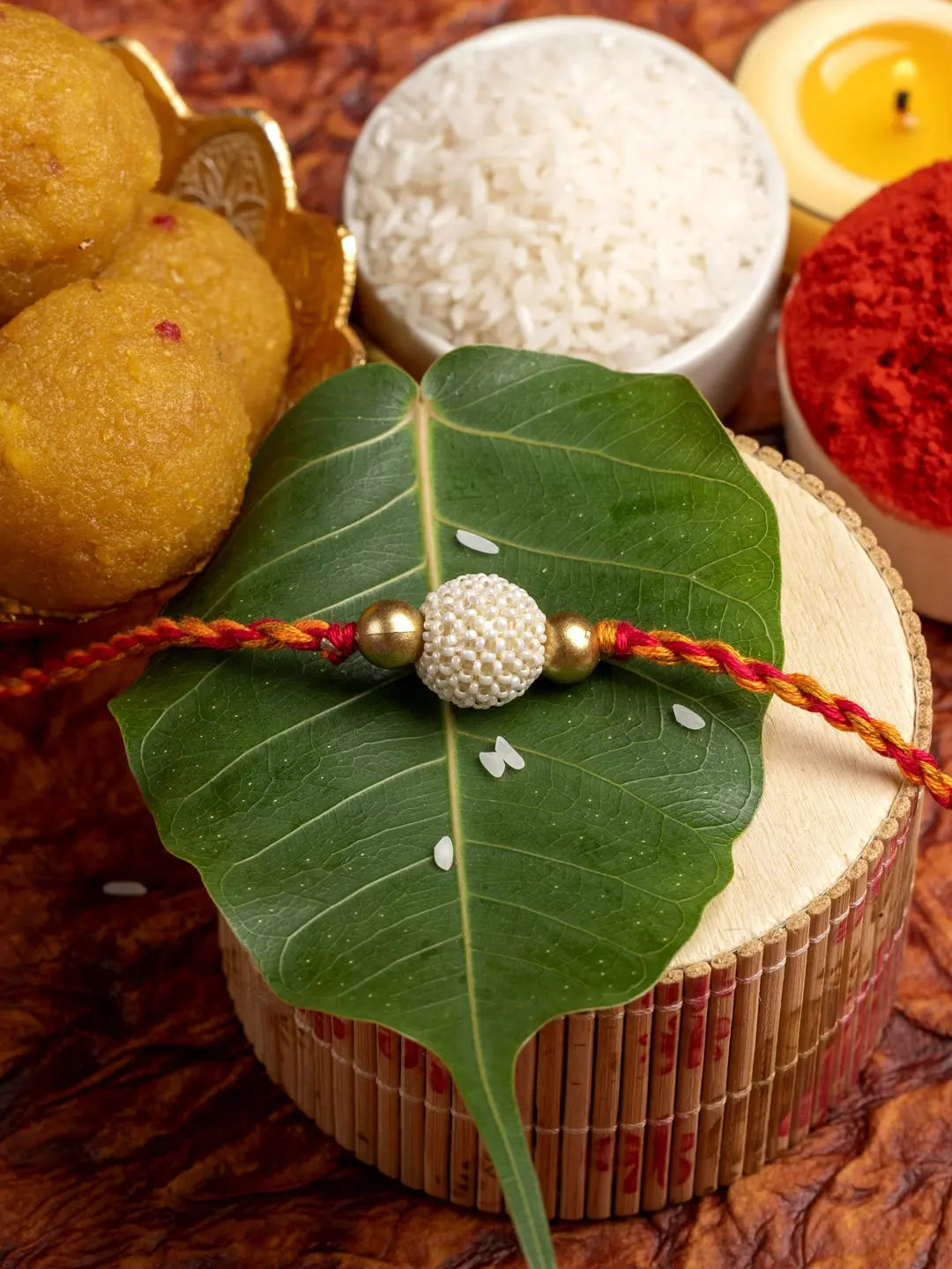 Handmade Beaded Pearl Golden Rakhi for Men and Boys with Roli Chawal - Lookandadorn.com