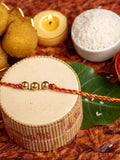 Designer Triplet Golden Bead Rakhi for Men and Boys with Roli Chawal - Lookandadorn.com