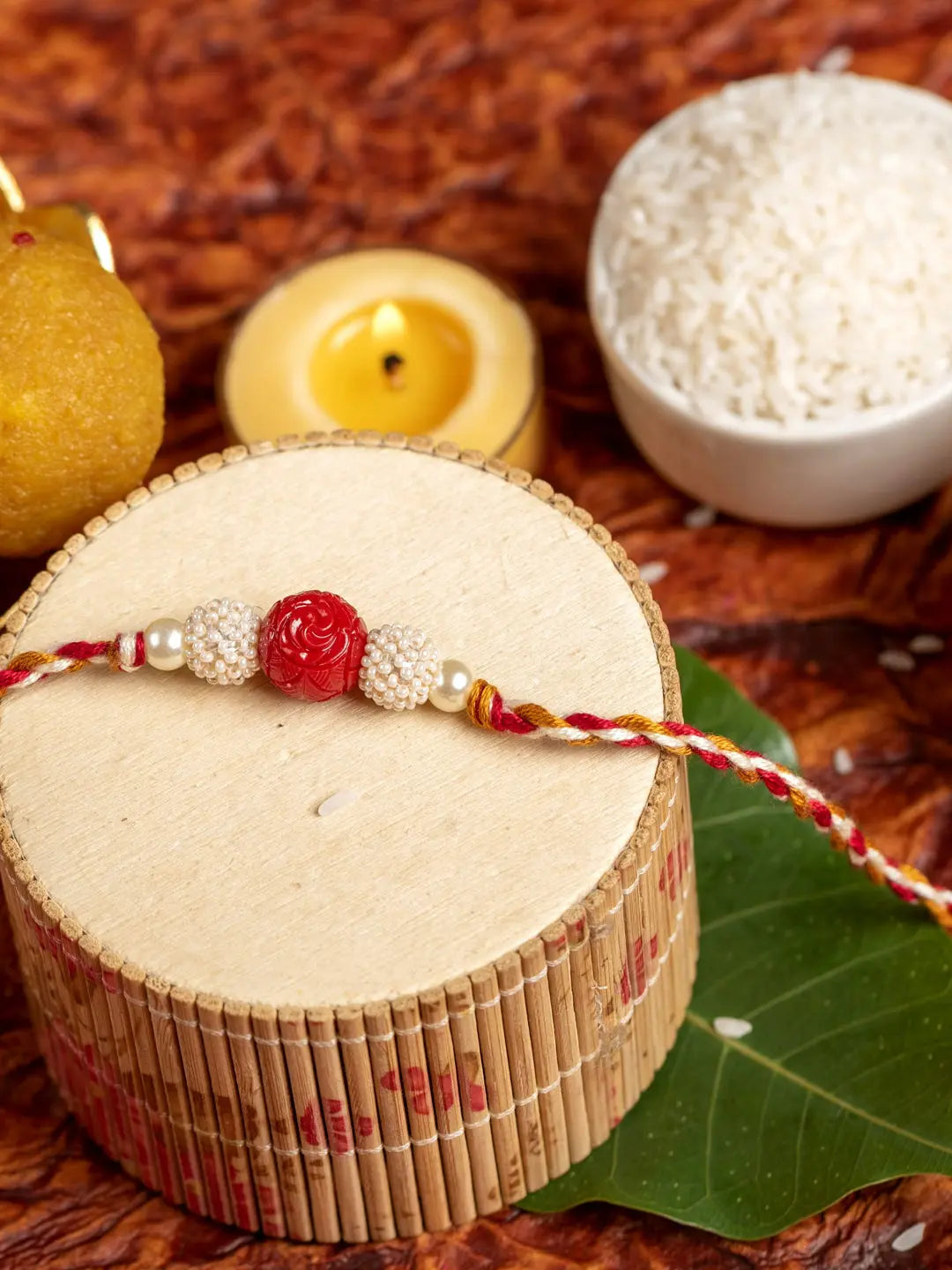 Handmade Red Cinnabar Beaded Pearl Rakhi for Men and Boys with Roli Chawal - Lookandadorn.com