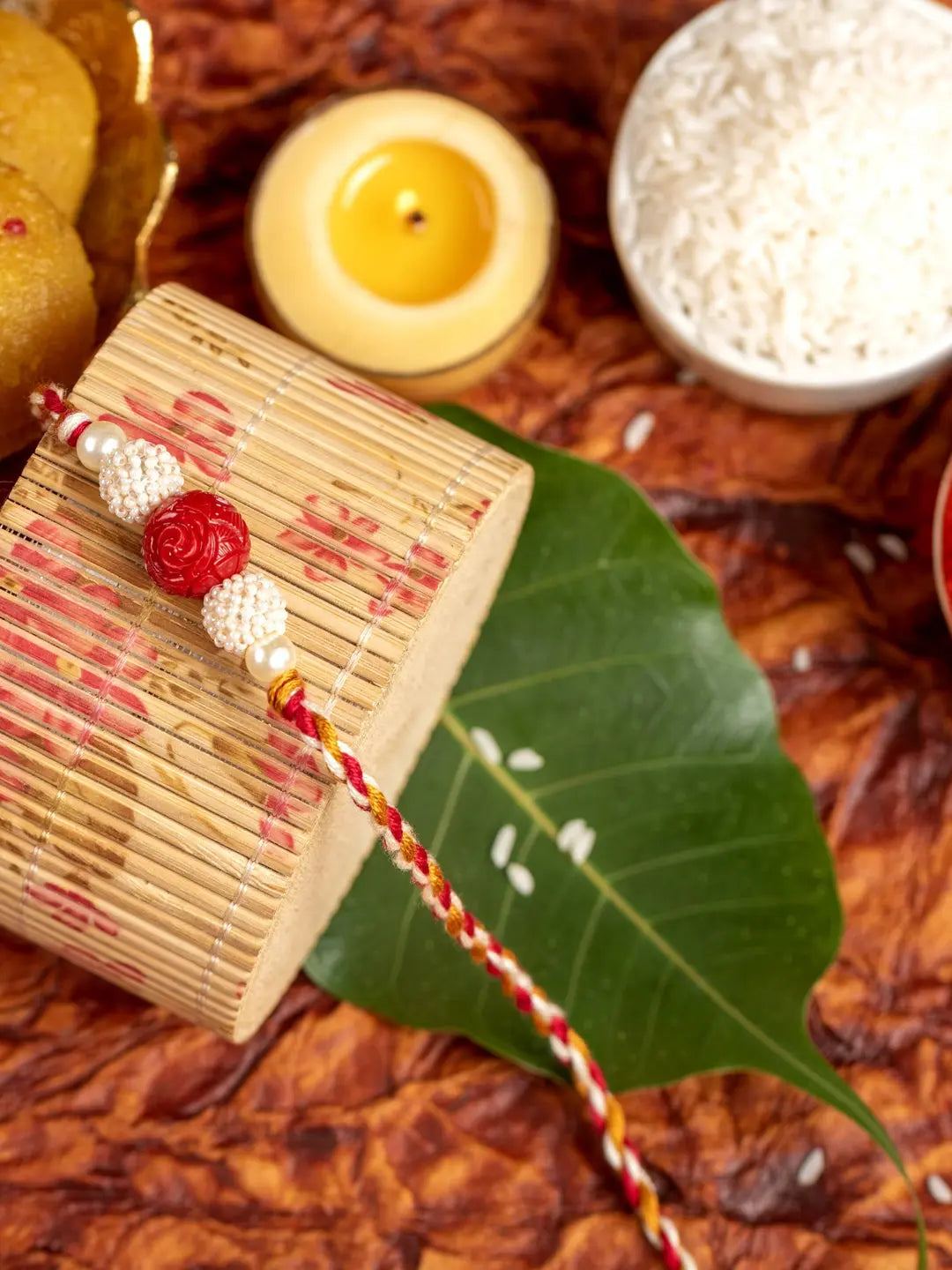 Handmade Red Cinnabar Beaded Pearl Rakhi for Men and Boys with Roli Chawal - Lookandadorn.com