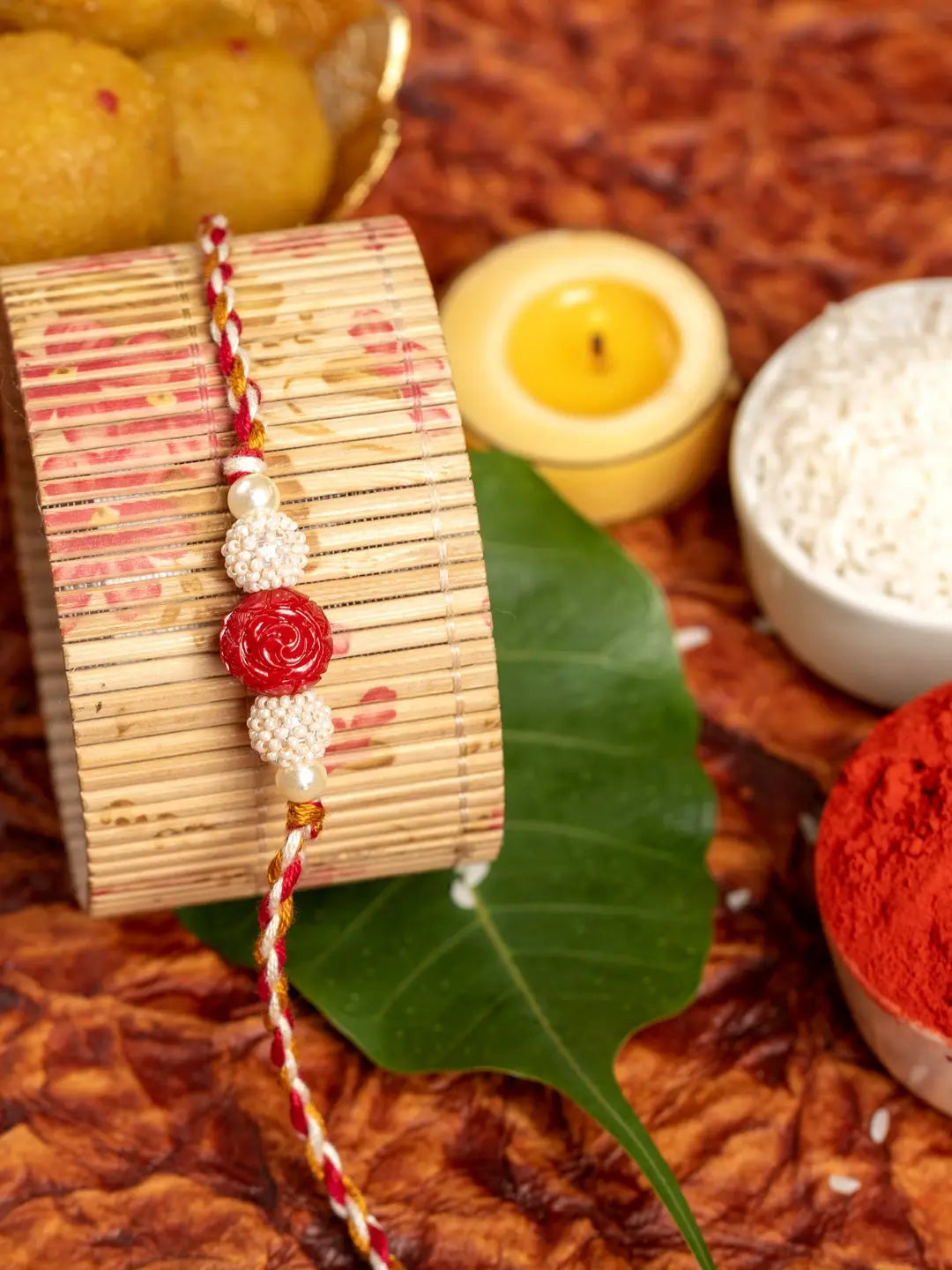 Handmade Red Cinnabar Beaded Pearl Rakhi for Men and Boys with Roli Chawal - Lookandadorn.com