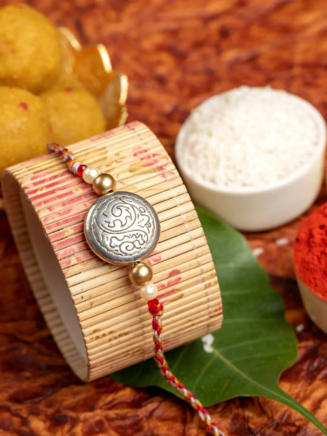 Designer Dual Tone Silver Golden Rakhi for Men and Boys with Roli Chawal - Lookandadorn.com