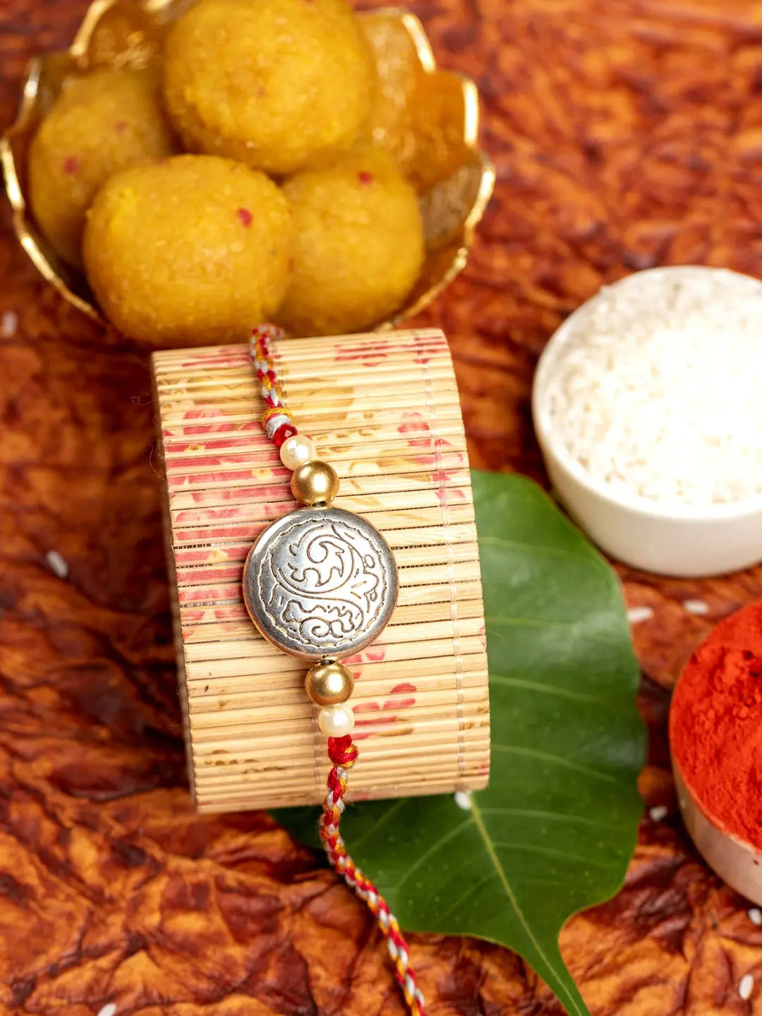 Designer Dual Tone Silver Golden Rakhi for Men and Boys with Roli Chawal - Lookandadorn.com