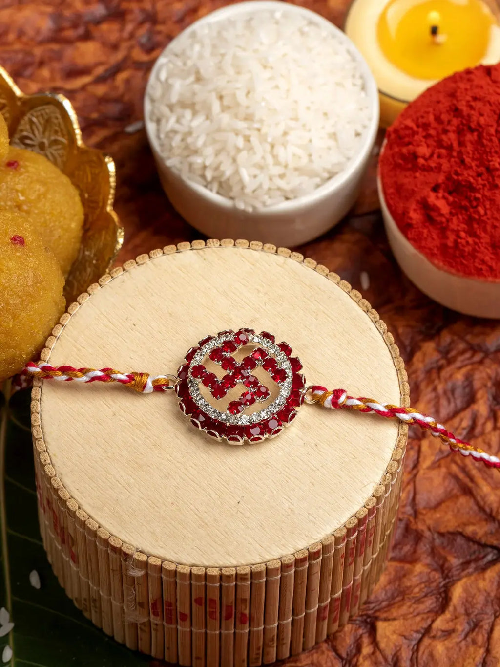 Exclusive Circular Red White American Diamond Swastik Rakhi Bracelet with Red White Golden Dori and Roli Chawal for Boys and Men - Lookandadorn.com