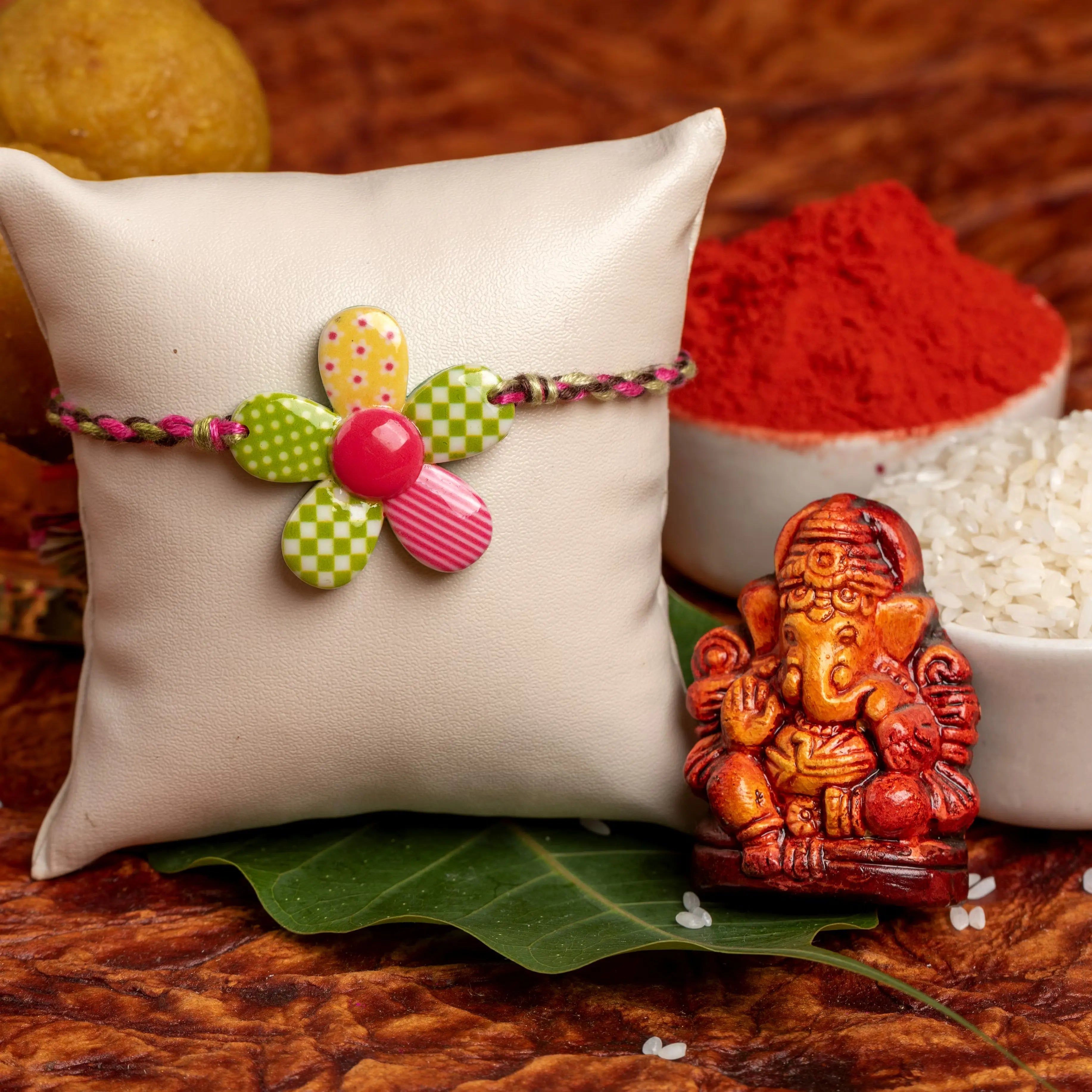Acrylic Multicolor Floral Rakhi with Multicolor Dori Roli Chawal for Boys & Kids - Lookandadorn.com