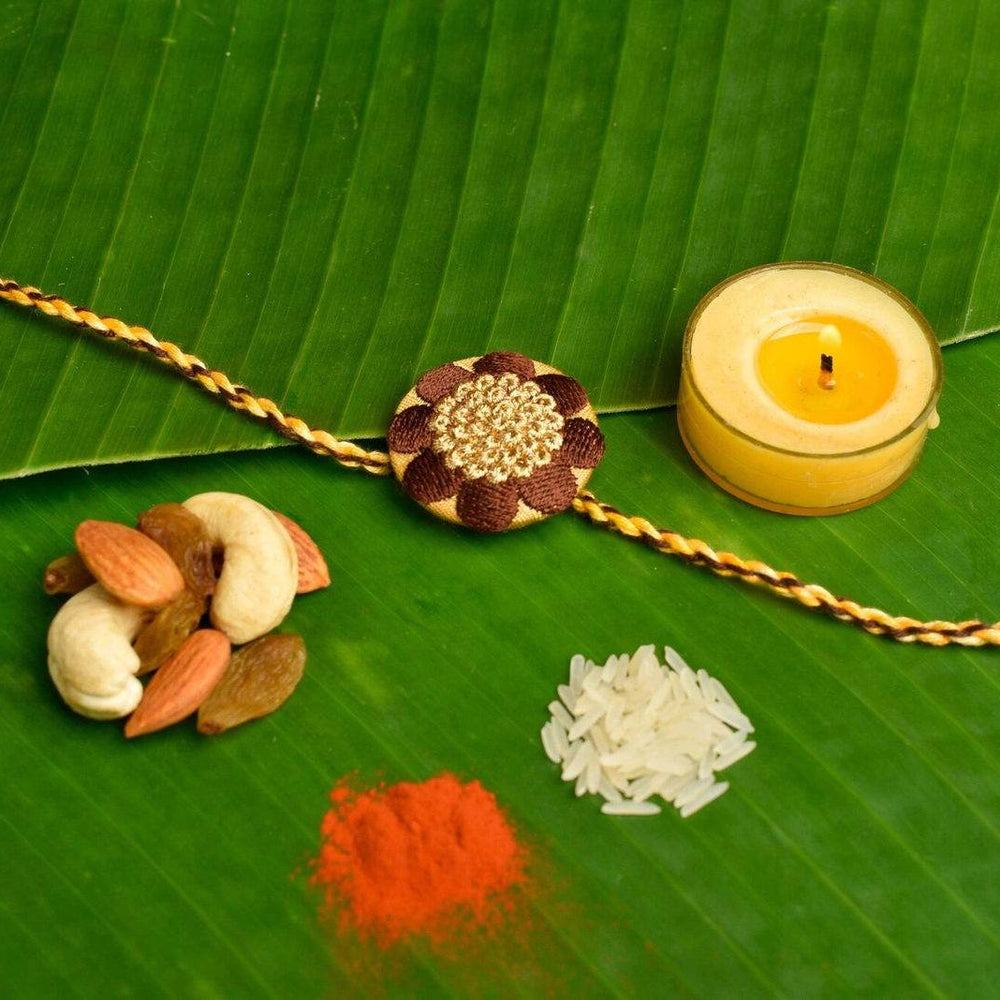 Brown And Golden Handmade Designer Embroidery Rakhi For Brother With Roli And Chawal - Lookandadorn.com