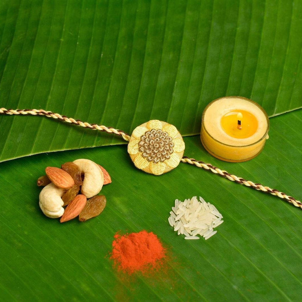 Cream Golden Embroidery Rakhi Set with Roli & Chawal - Handmade Designer Rakhi for Brothers - Lookandadorn.com