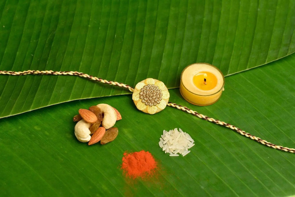 Cream Golden Embroidery Rakhi Set with Roli & Chawal - Handmade Designer Rakhi for Brothers - Lookandadorn.com