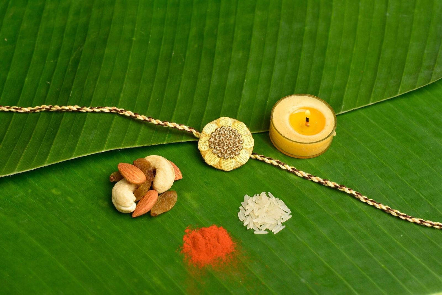 Cream Golden Embroidery Rakhi Set with Roli & Chawal - Handmade Designer Rakhi for Brothers - Lookandadorn.com