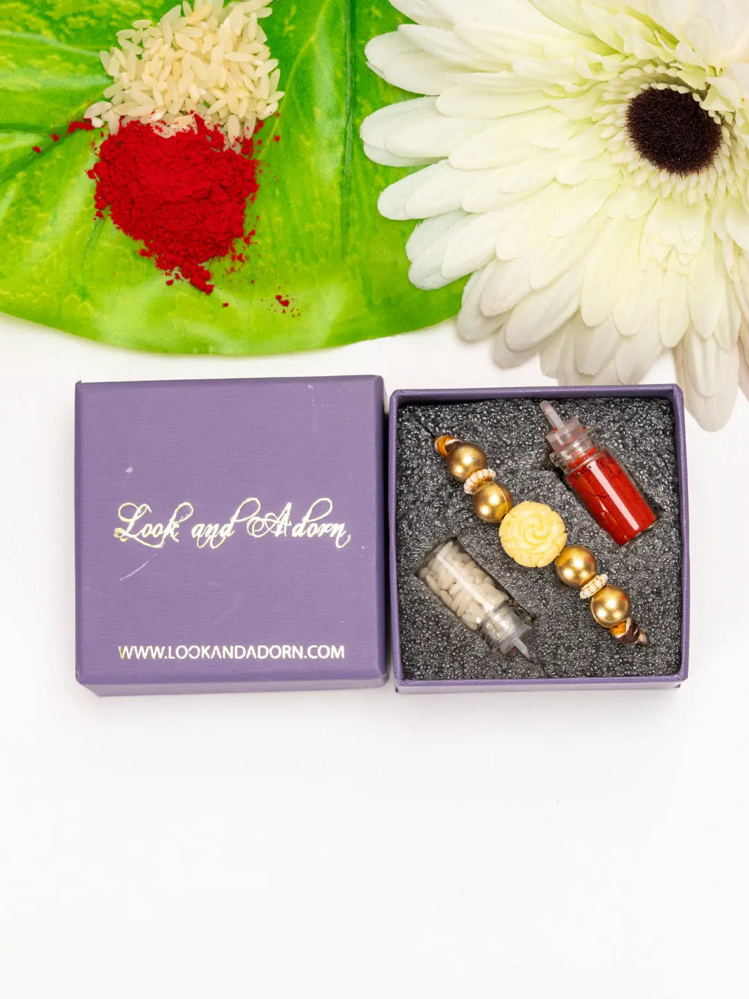 Handmade Beige Carved Bead Focal Golden Rakhi for Men and Boys with Roli Chawal - Lookandadorn.com