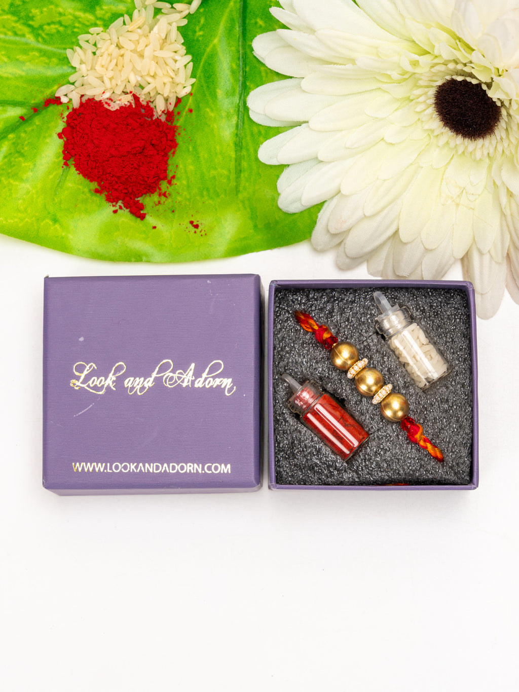 Designer Triplet Golden Bead Rakhi for Men and Boys with Roli Chawal - Lookandadorn.com