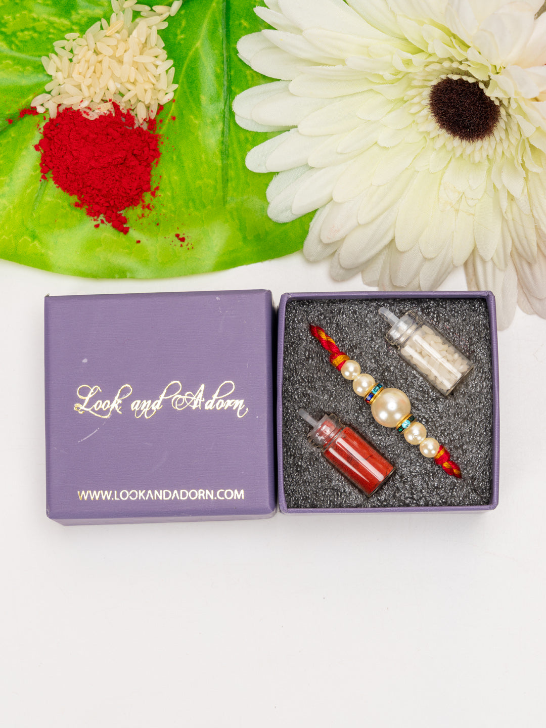 Handmade Designer Shell Pearl Rakhi with Roli Chawal - Lookandadorn.com