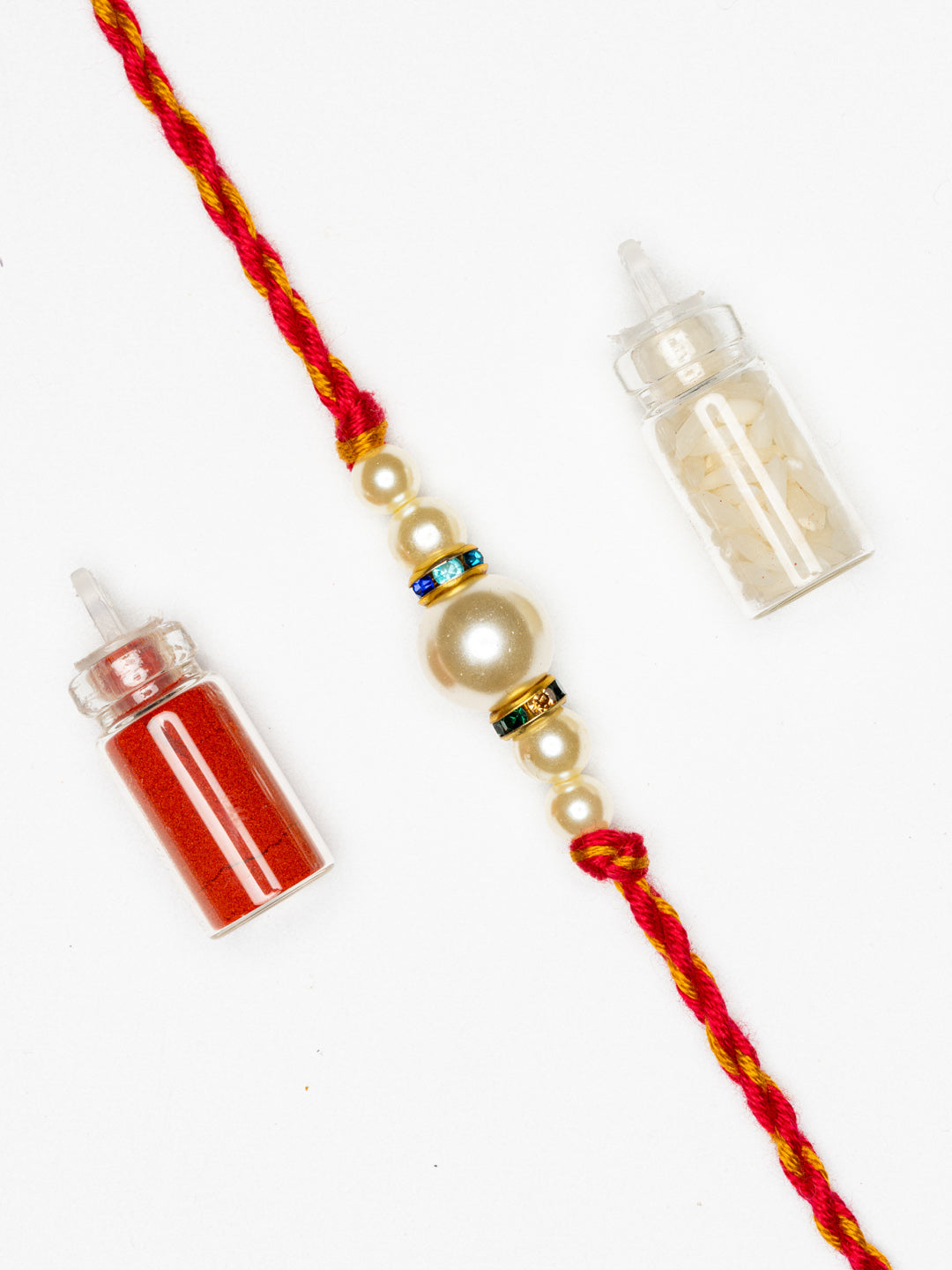 Handmade Designer Shell Pearl Rakhi with Roli Chawal - Lookandadorn.com