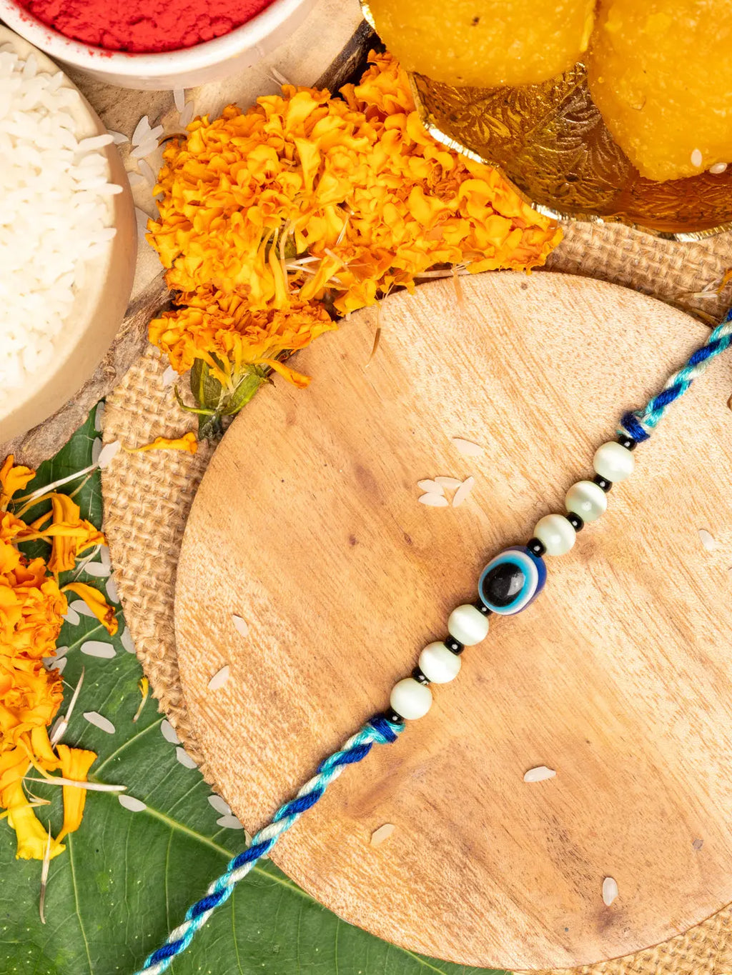 Green Blue Onyx Cat's Eye Evil Eye Rakhi With Roli Chawal for Raksha Bandhan Celebration - Lookandadorn.com