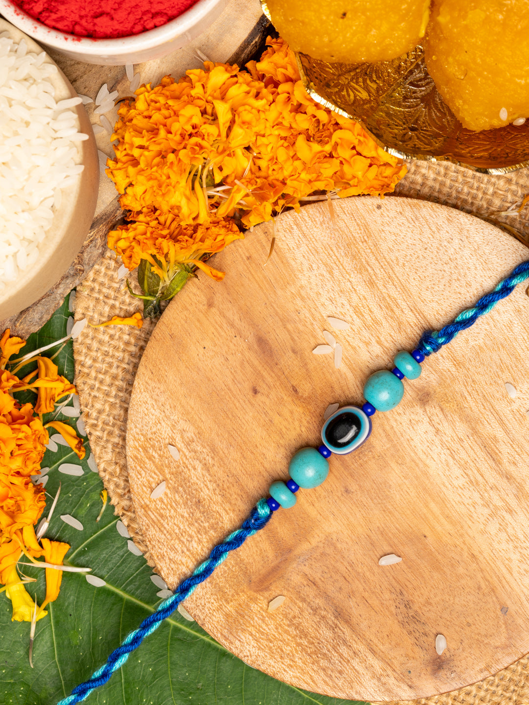 Turquoise Blue Onyx Evil Eye Rakhi With Roli & Chawal - Handmade Designer Rakhi For Brothers - Lookandadorn.com