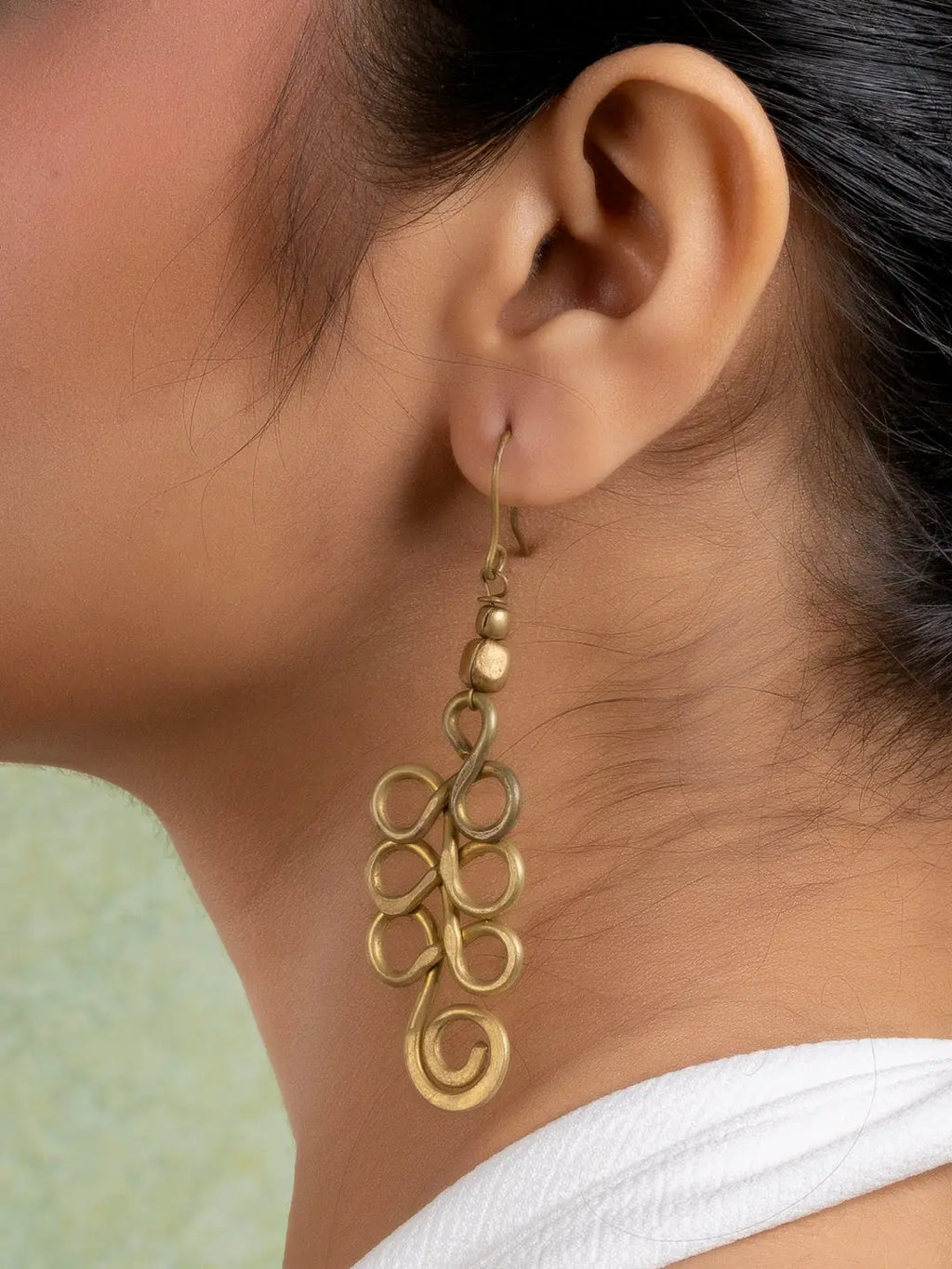 Golden Brass Dokra Spiral Earring LOOK AND ADORN - designed for you
