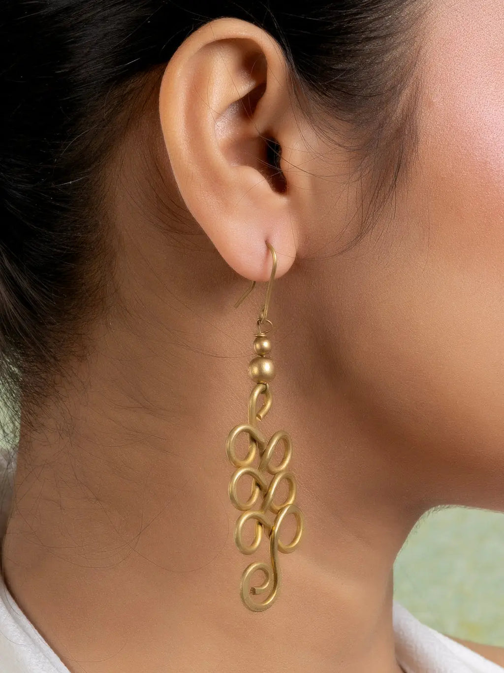 Golden Brass Dokra Spiral Earring LOOK AND ADORN - designed for you