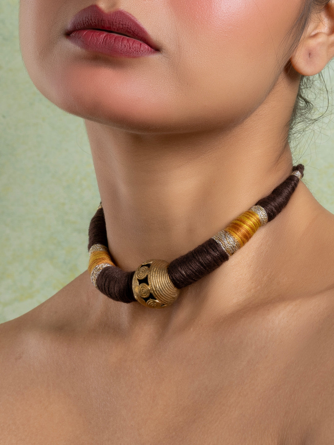Golden Brass Dokra Focal Necklace with adjustable Brown Dori