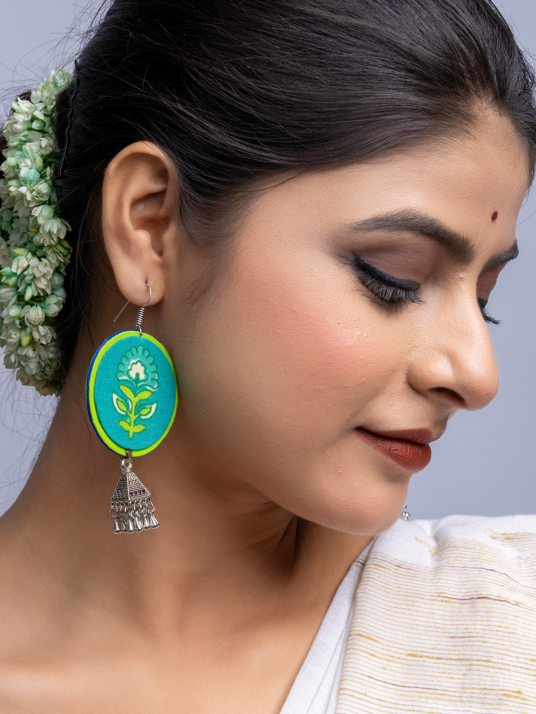 Teal Green Fabric German Silver Jhumka Earrings - Lookandadorn.com