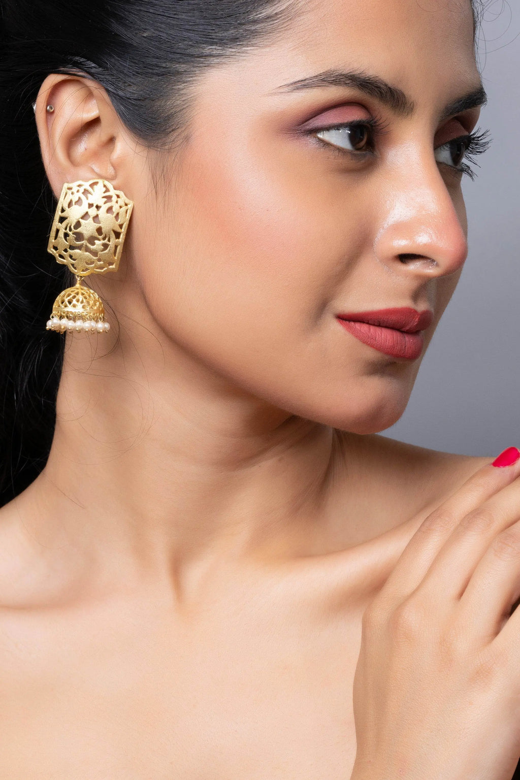 Designer Brass Jhumka Stud Earring in Golden Finish - Lookandadorn.com
