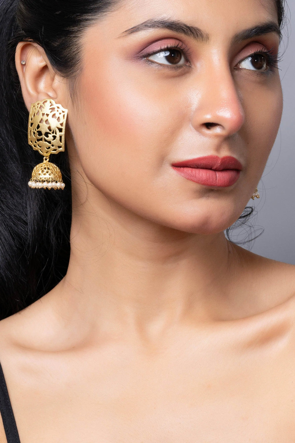 Designer Brass Jhumka Stud Earring in Golden Finish - Lookandadorn.com