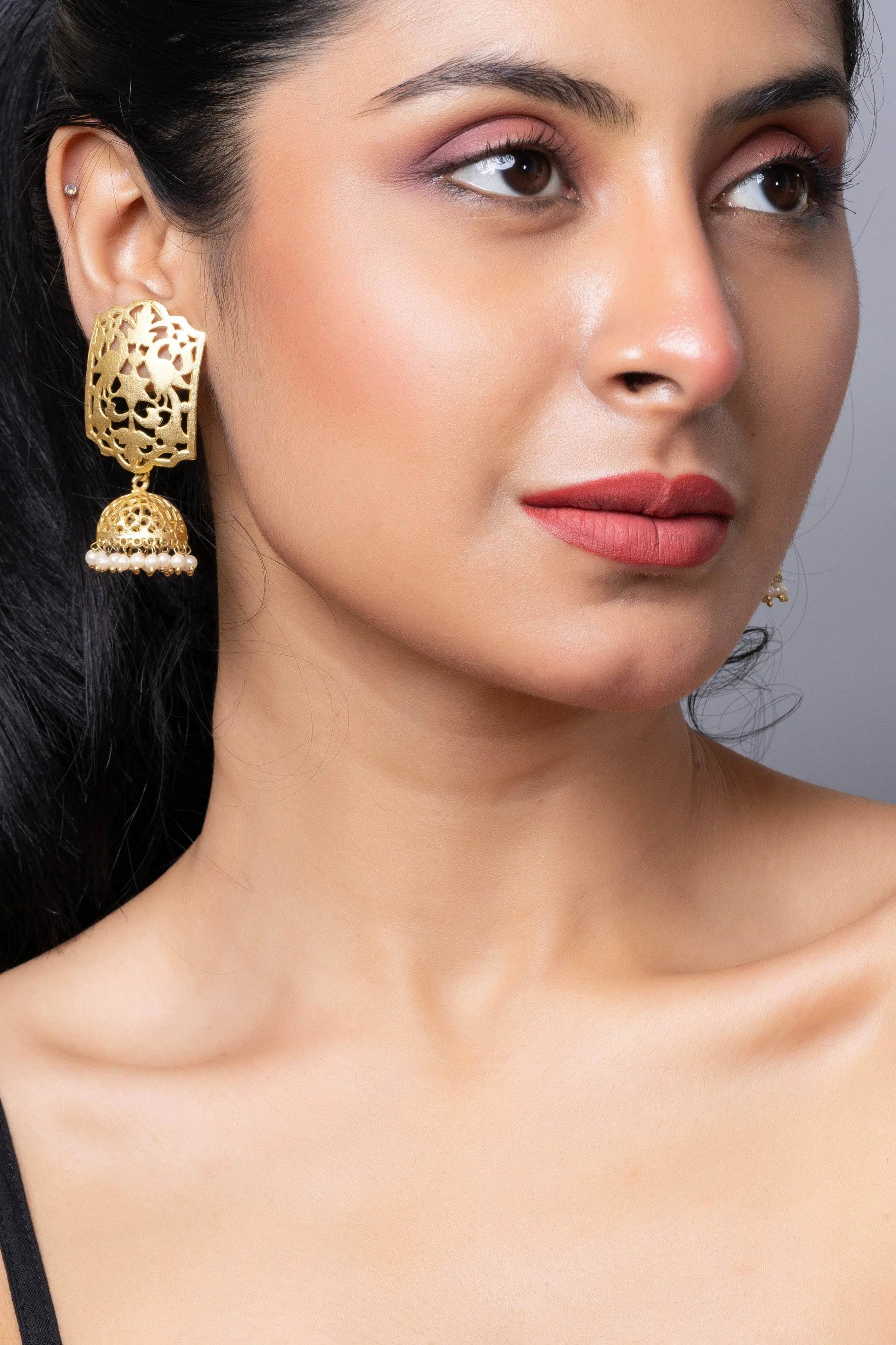 Designer Brass Jhumka Stud Earring in Golden Finish - Lookandadorn.com