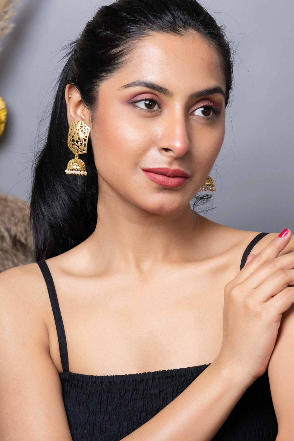 Designer Brass Jhumka Stud Earring in Golden Finish - Lookandadorn.com