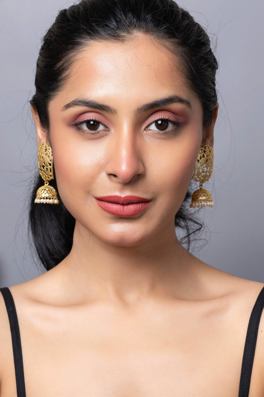 Designer Brass Jhumka Stud Earring in Golden Finish - Lookandadorn.com