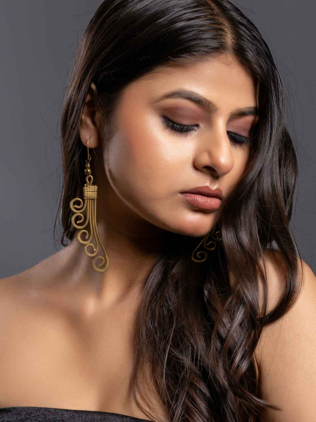 Golden Brass Dokra Spiral Dangler Earrings