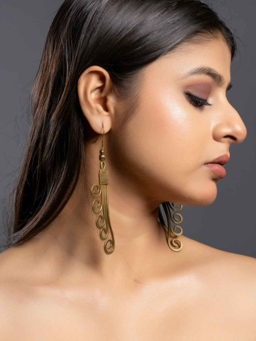 Golden Brass Dokra Spiral Dangler Earrings