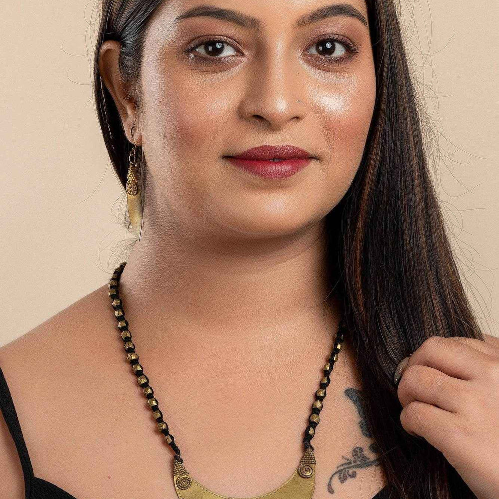 Designer Handcrafted Dokra Jewelry Brass Crescent Moon Pendant Neckpiece With Leaf Earrings Set - Lookandadorn.com