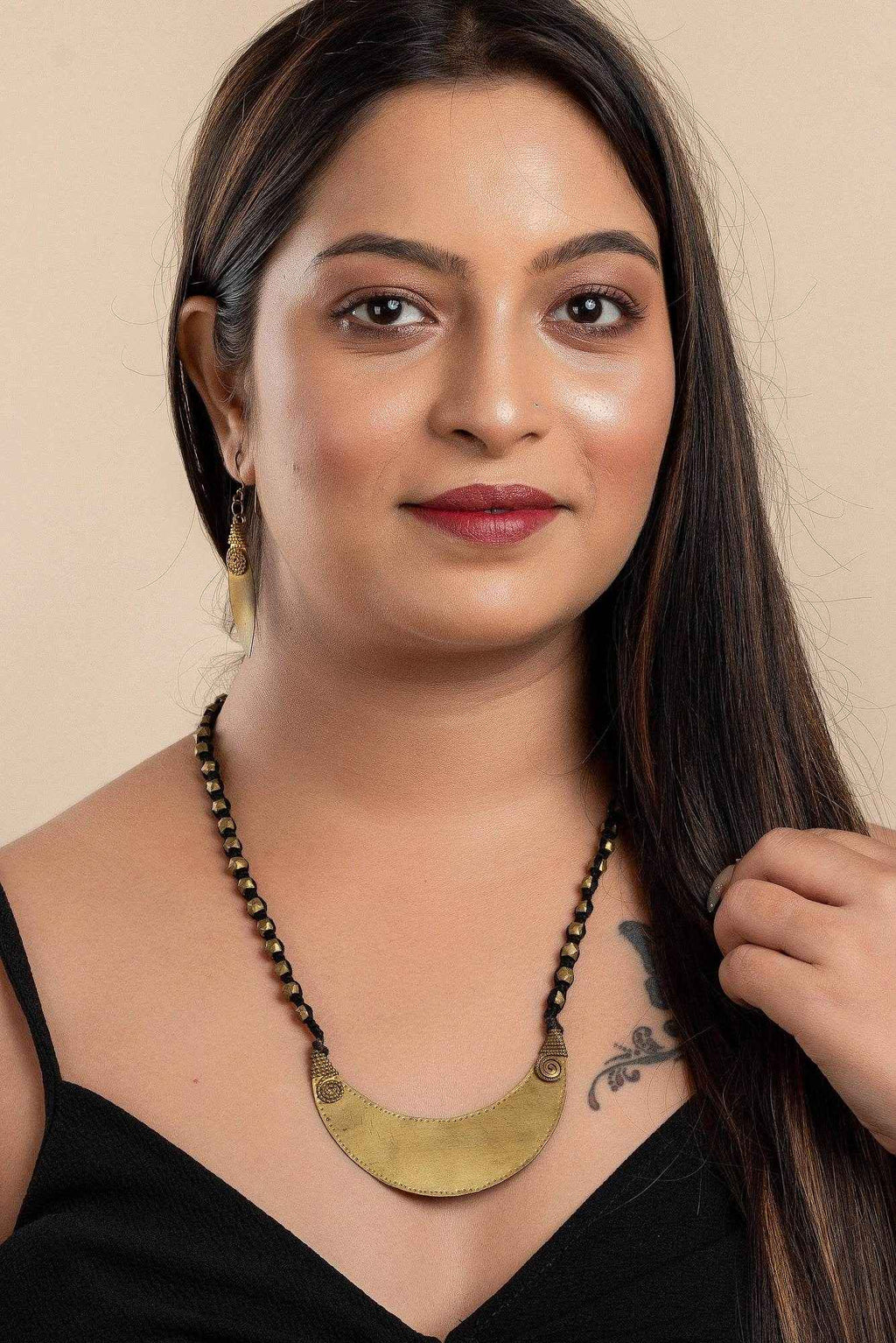 Designer Handcrafted Dokra Jewelry Brass Crescent Moon Pendant Neckpiece With Leaf Earrings Set - Lookandadorn.com