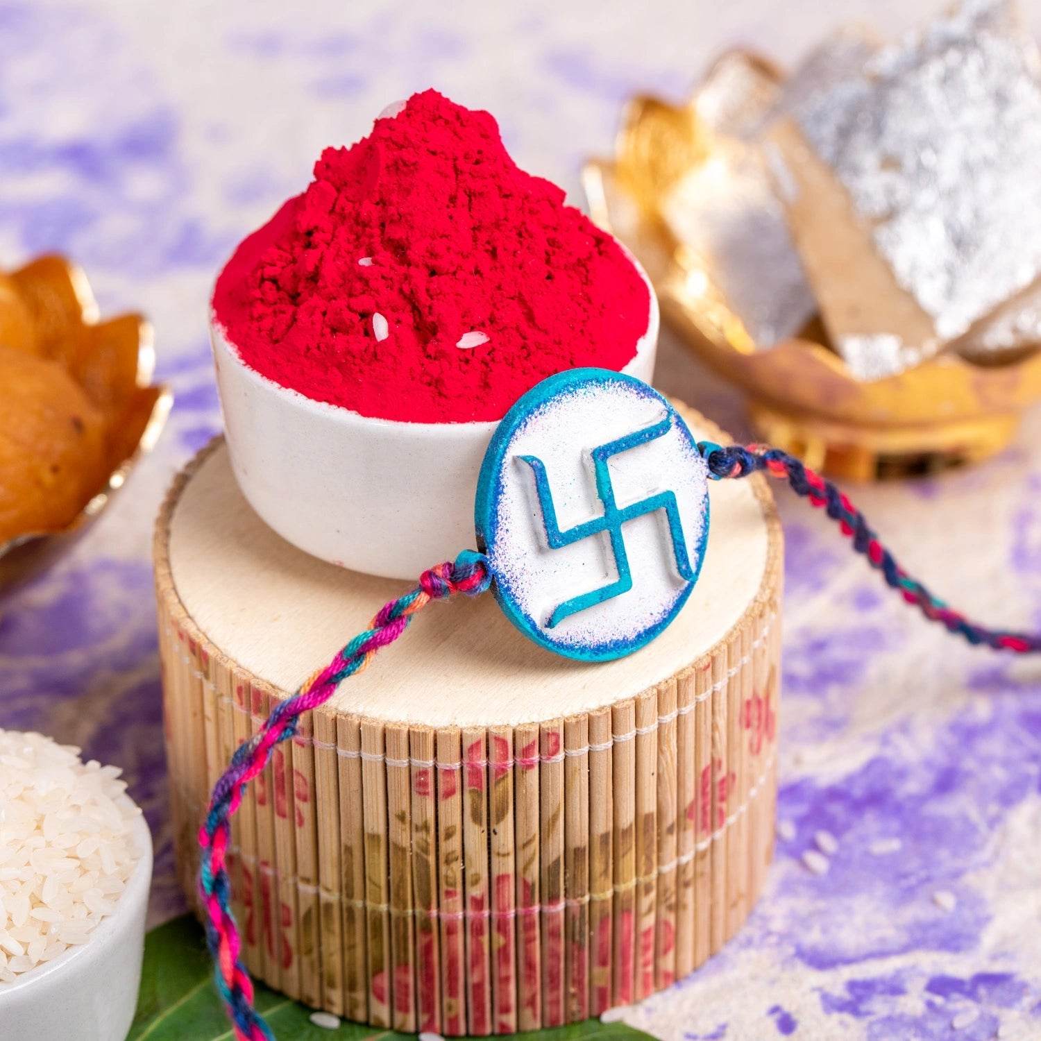 Designer Handpainted Circular Swastik Rakhi for Brother with Roli and Chawal for Raksha Bandhan - Lookandadorn.com