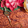 Handmade Designer Semi Precious Hand Painted Tanjore Rakhi with Roli and Chawal for Brother's Blessing - Lookandadorn.com
