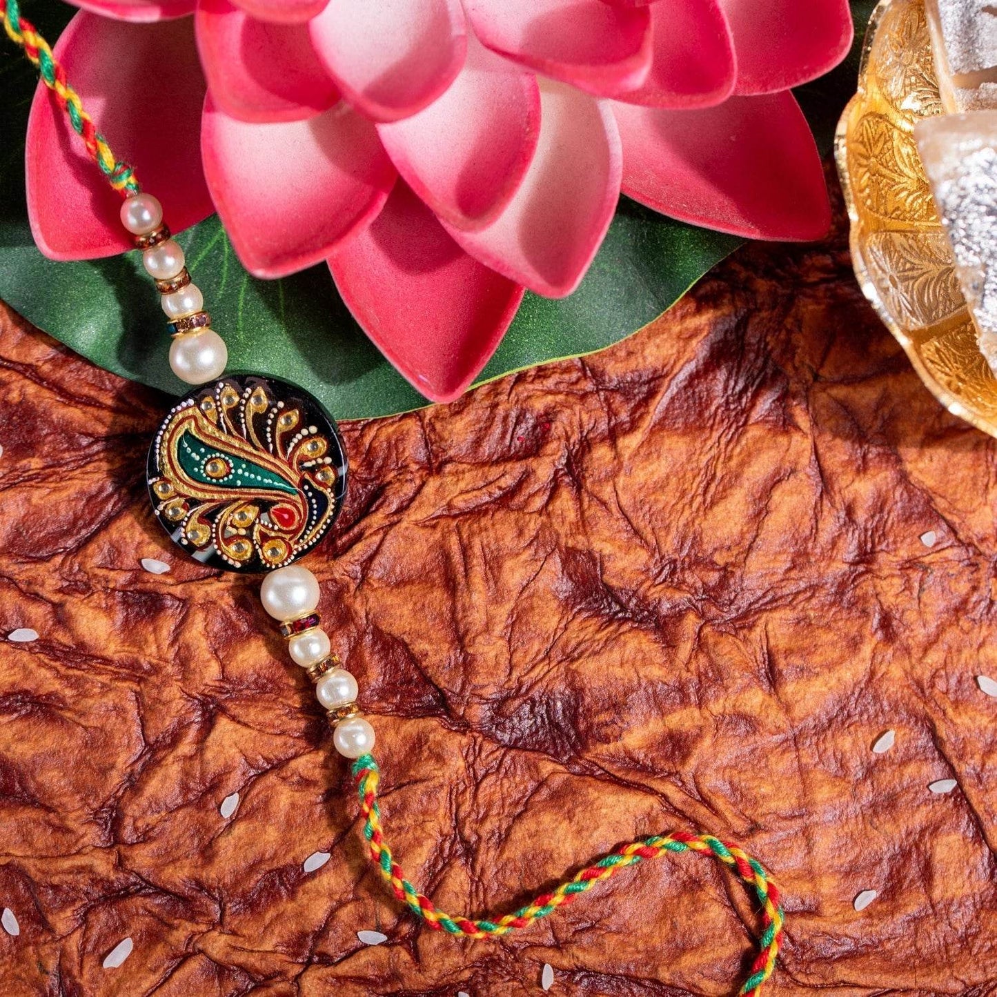 Handmade Designer Semi Precious Hand Painted Tanjore Rakhi with Roli and Chawal for Brother's Blessing - Lookandadorn.com