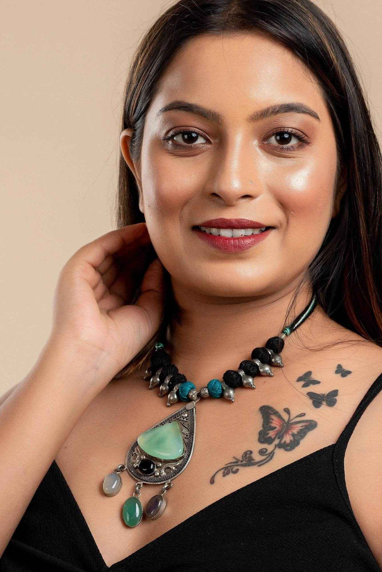 Designer Dual Tone Adjustable Cotton Dori Neckpiece with Semi Precious Stone Studded German Silver Pendant - Lookandadorn.com