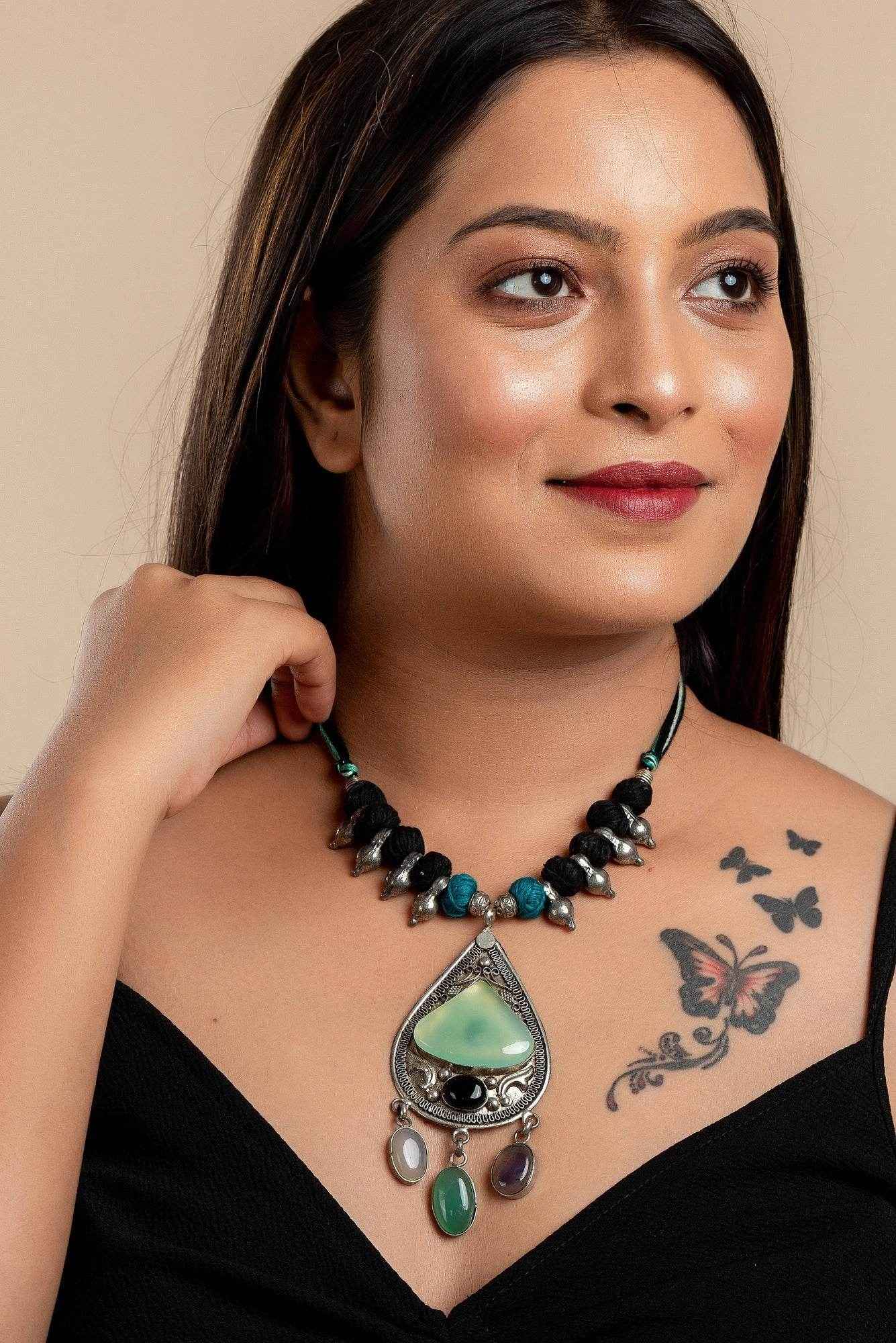 Designer Dual Tone Adjustable Cotton Dori Neckpiece with Semi Precious Stone Studded German Silver Pendant - Lookandadorn.com