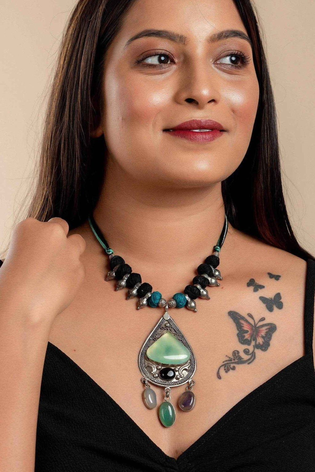 Designer Dual Tone Adjustable Cotton Dori Neckpiece with Semi Precious Stone Studded German Silver Pendant - Lookandadorn.com