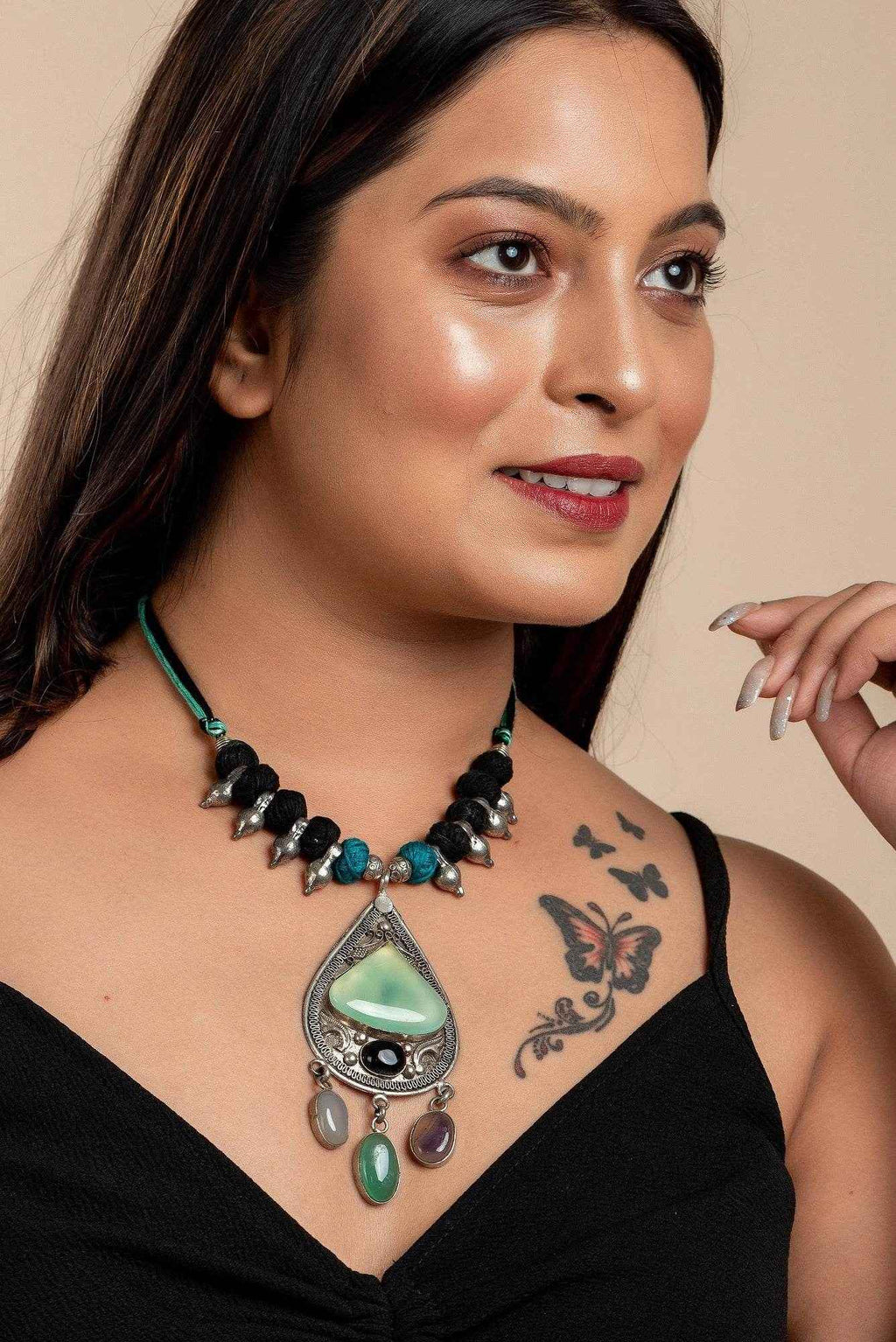Designer Dual Tone Adjustable Cotton Dori Neckpiece with Semi Precious Stone Studded German Silver Pendant - Lookandadorn.com