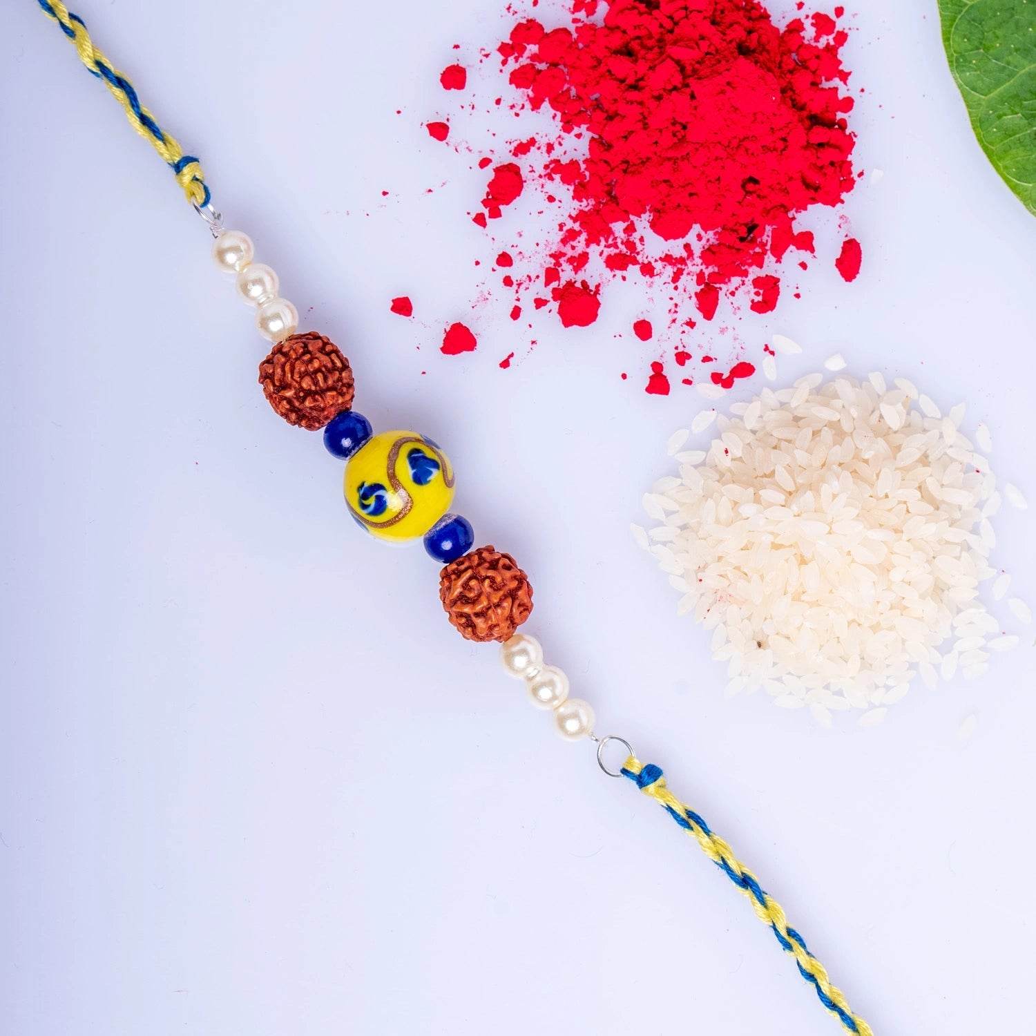 Handmade Designer Yellow Ceramic Bead Rakhi Set With Roli And Chawal - Lookandadorn.com