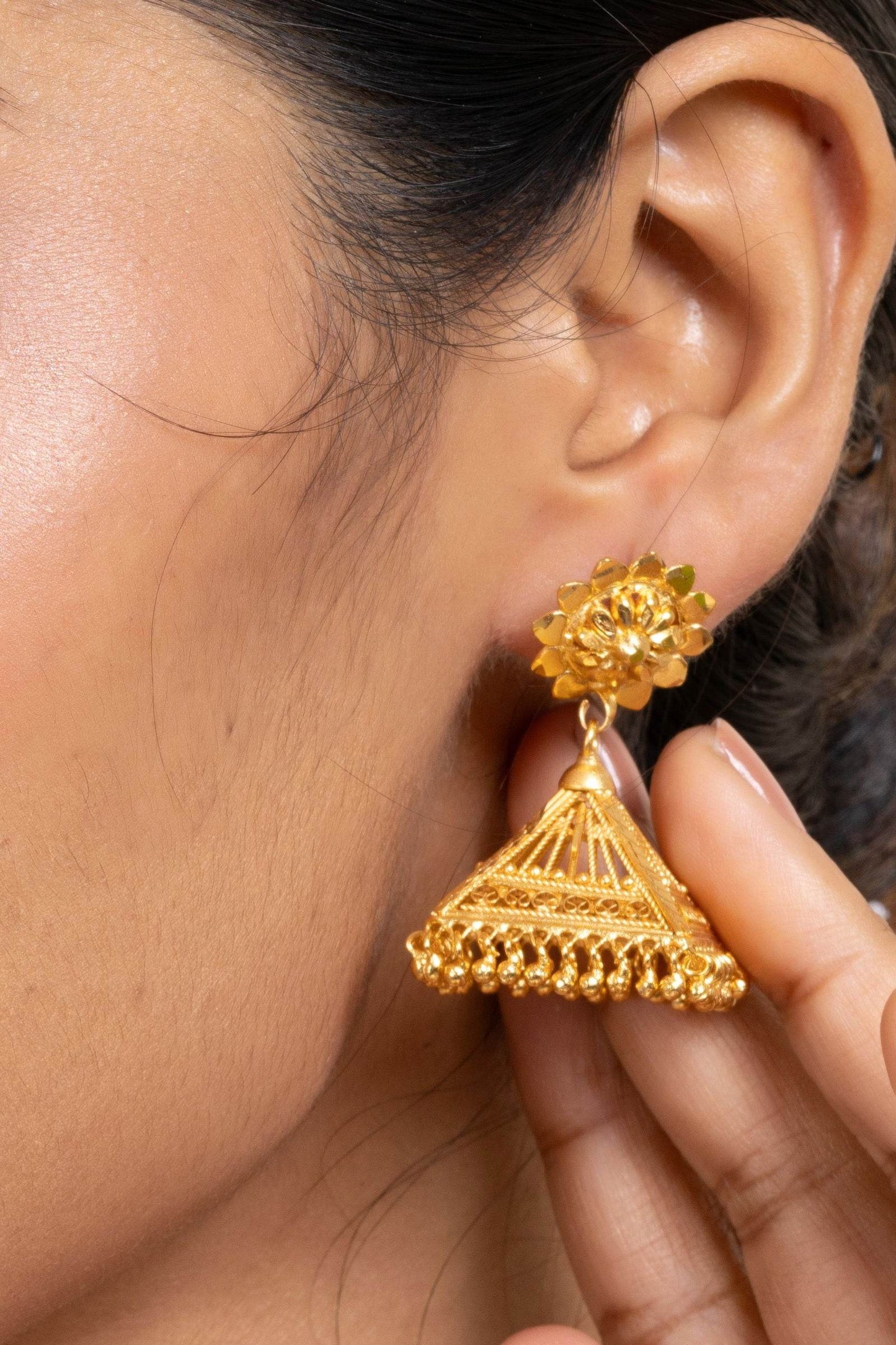 Gold Plated Floral Studs And Pyramid Jhumka Earrings Exquisite