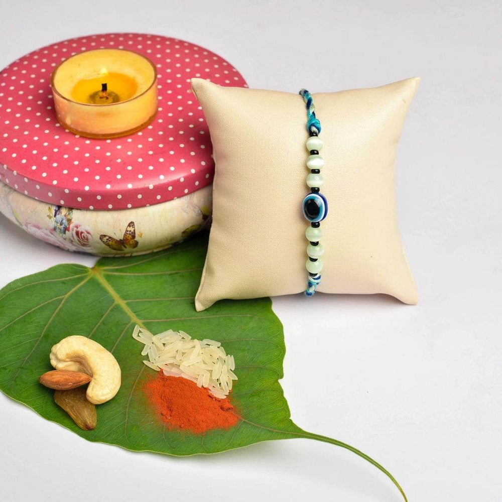 Green Blue Onyx Cat's Eye Evil Eye Rakhi With Roli Chawal for Raksha Bandhan Celebration - Lookandadorn.com
